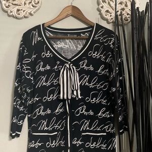 New York & Co. cardigan with bow and writing detail.